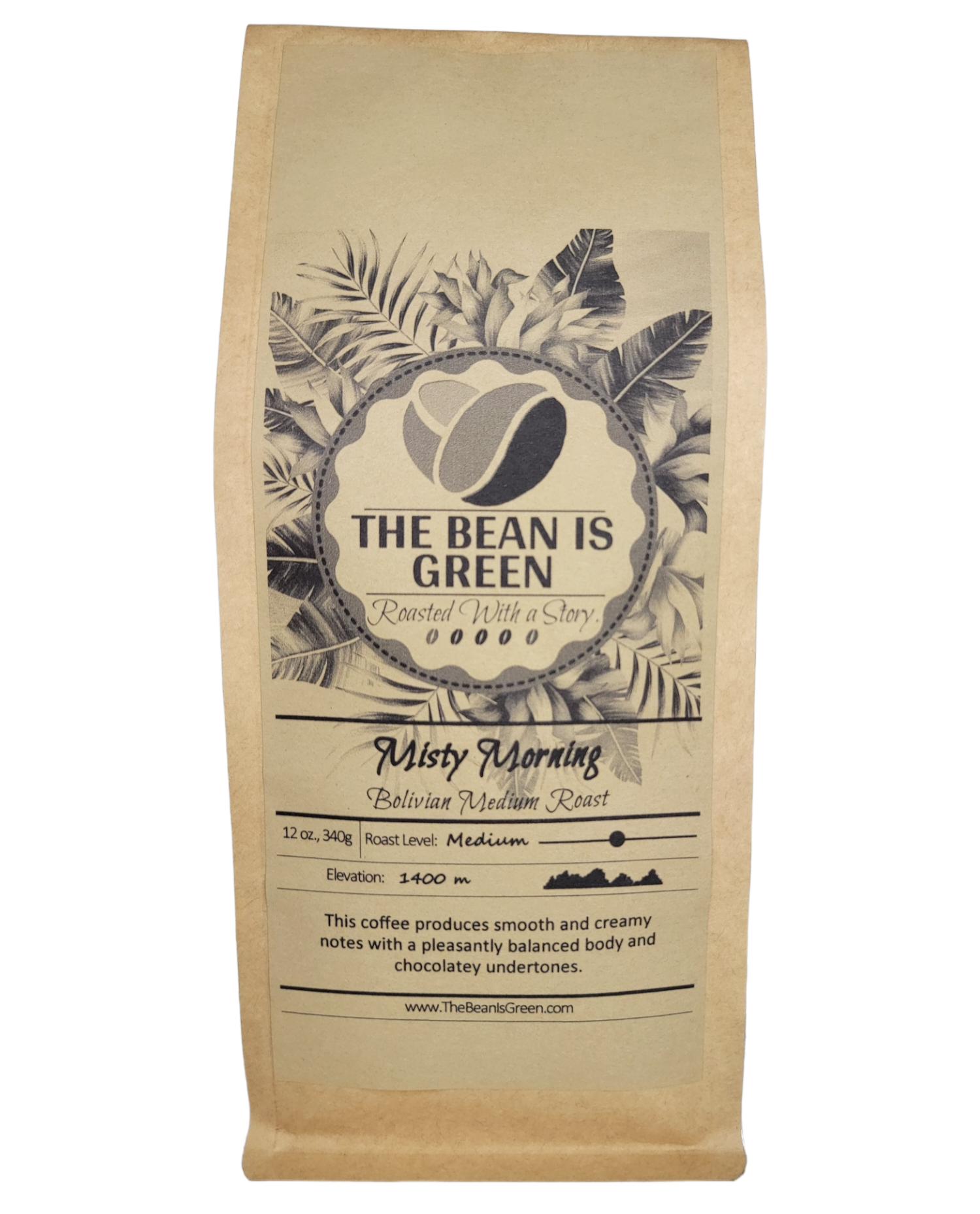 Brown kraft bag with The Bean Is Green grey-wash tropical logo. Misty Morning - Organic Bolivian Medium Roast Whole Bean Coffee. Elevation 1400m with graph shown. This coffee produces smooth and creamy notes with a pleasantly balanced body and chocolatey undertones. - website = www.thebeanisgreen.com